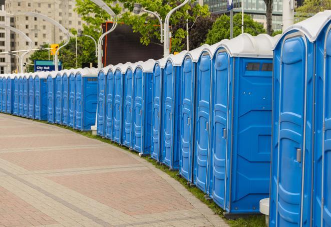 a row of sleek and modern portable restrooms at a special outdoor event in Avila Beach